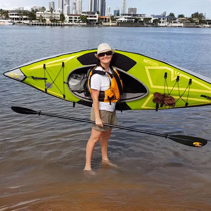 AdvancedFrame Ultralite Kayak Woman Lifting the Kayak