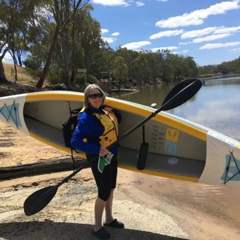Air Glide 385 Kayak lifted by a woman