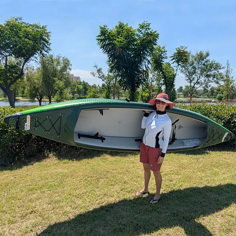 Odyssey Solo Kayak lifted by a woman