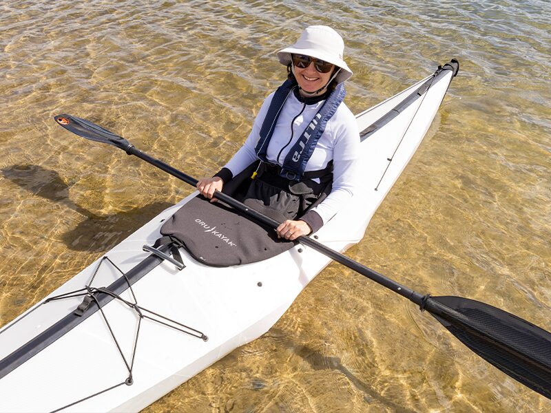 emily in oru kayak bay with spray skirt2